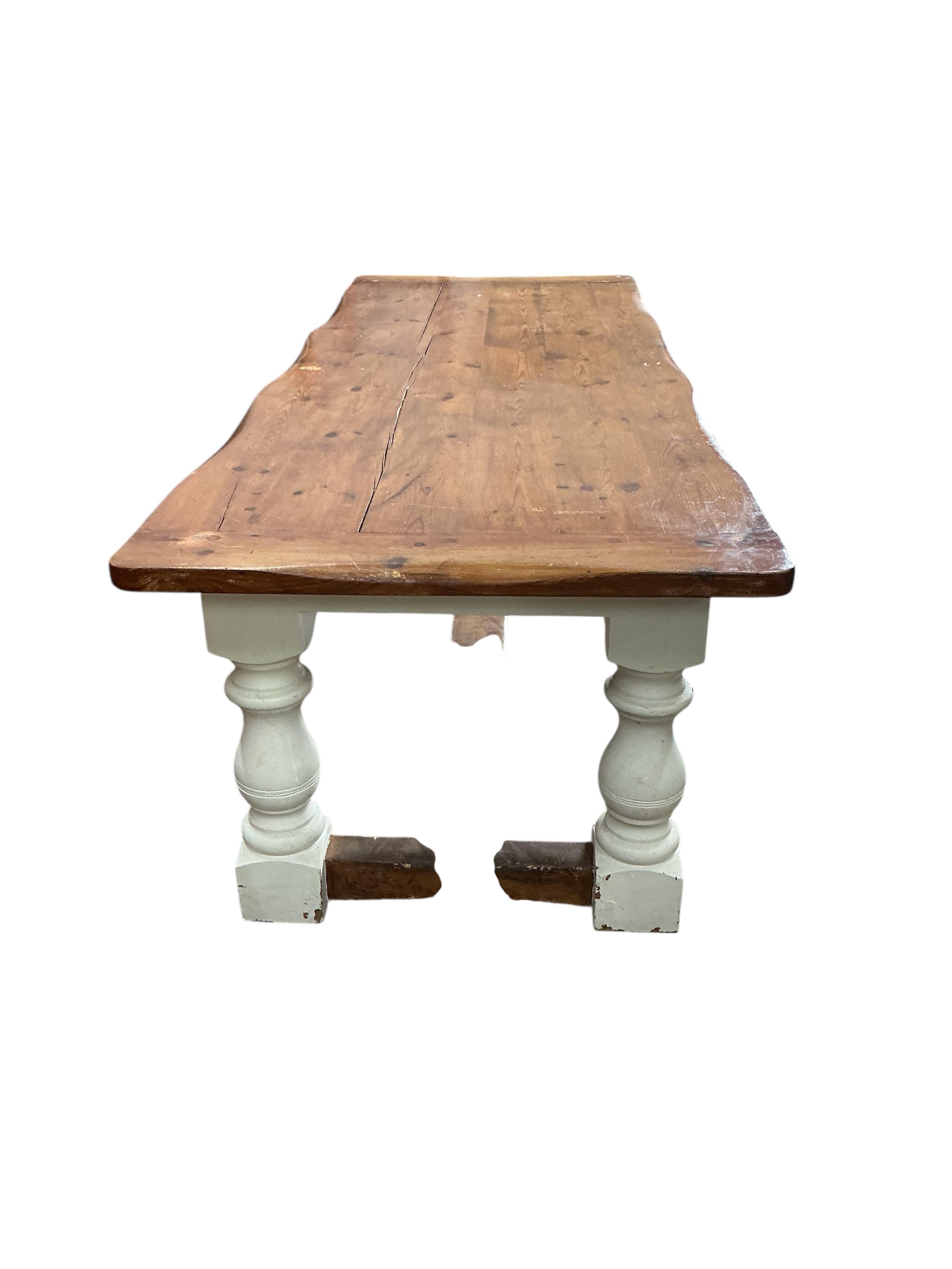 An 18th century style part painted rectangular pine refectory dining table, width 241cm, depth 92cm, height 74cm